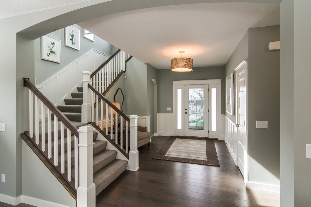 Mid-sized transitional carpeted u-shaped staircase photo in Minneapolis with carpeted risers