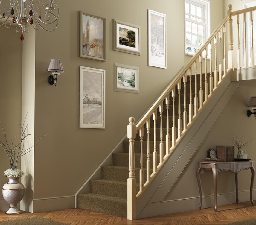 Idée de décoration pour un escalier droit design avec des marches en moquette, des contremarches en moquette et un garde-corps en bois.