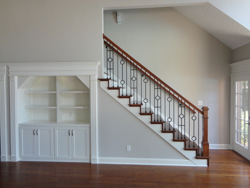 Staircase - large modern wooden straight staircase idea in Houston with wooden risers