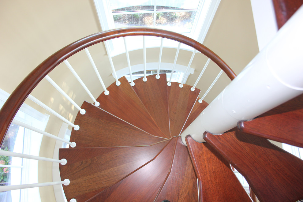 Inspiration for a mid-sized timeless wooden curved open staircase remodel in Baltimore