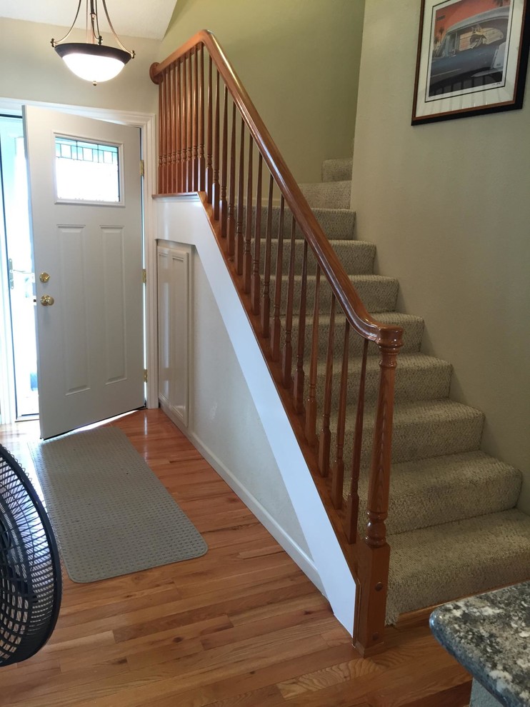 Staircase - small traditional carpeted l-shaped staircase idea in San Francisco with carpeted risers