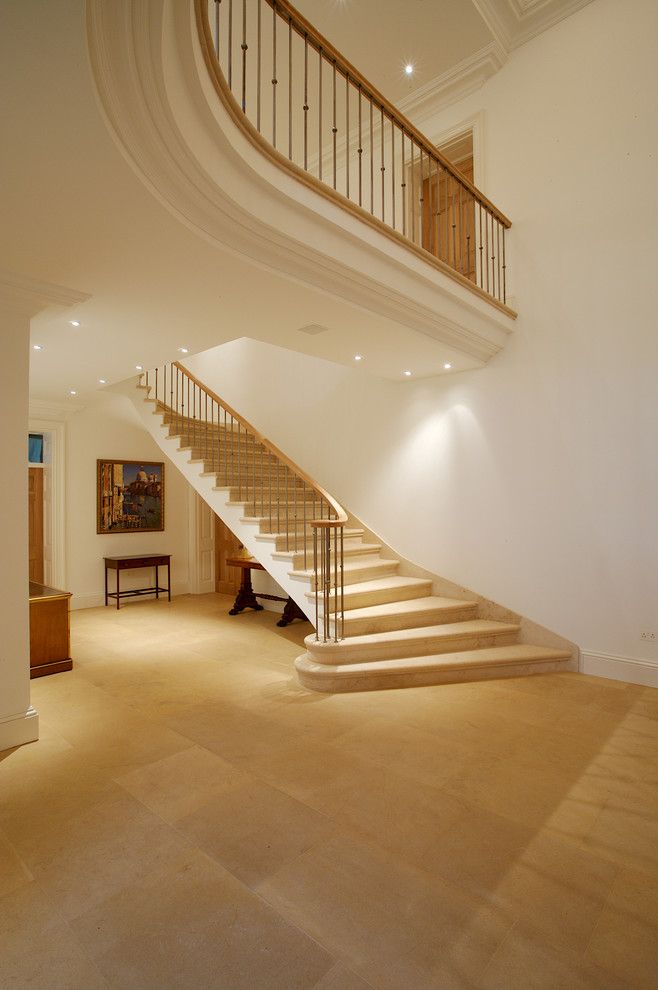 Inspiration for a huge timeless curved staircase remodel in Other