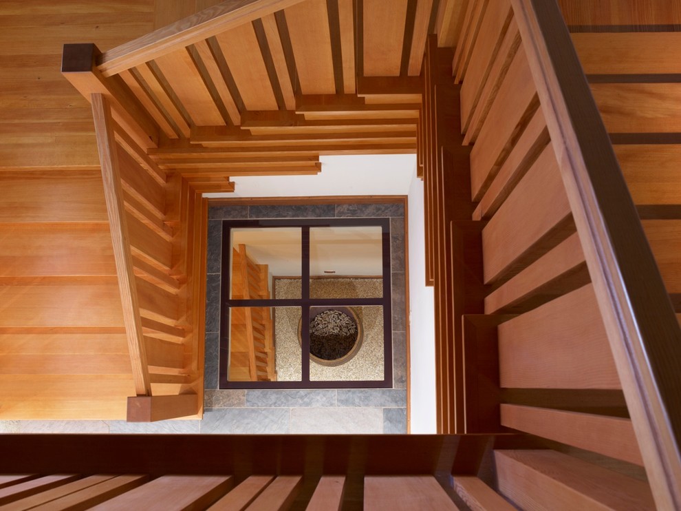 Inspiration for a craftsman wooden spiral staircase remodel in San Francisco