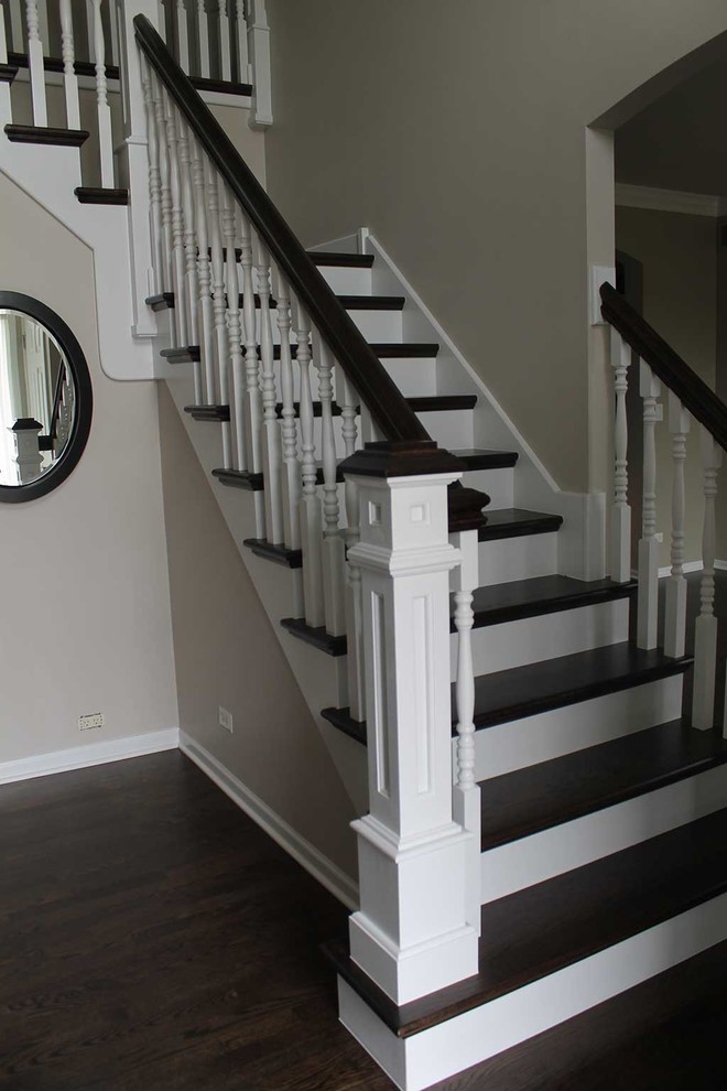Mid-sized elegant wooden l-shaped staircase photo in Chicago with painted risers