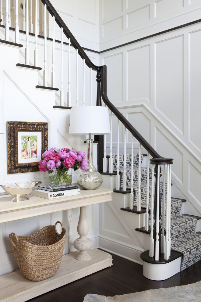 Design ideas for a classic wood l-shaped staircase in New York with painted wood risers.