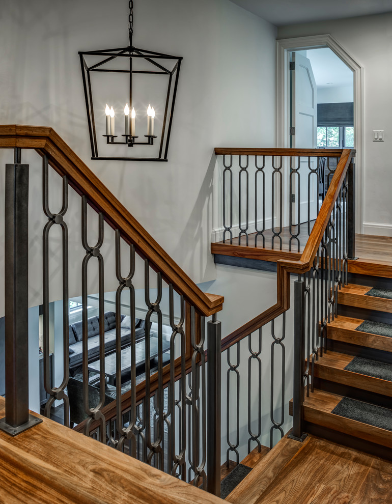 Example of a mid-sized mountain style wooden l-shaped open and wood railing staircase design in Detroit
