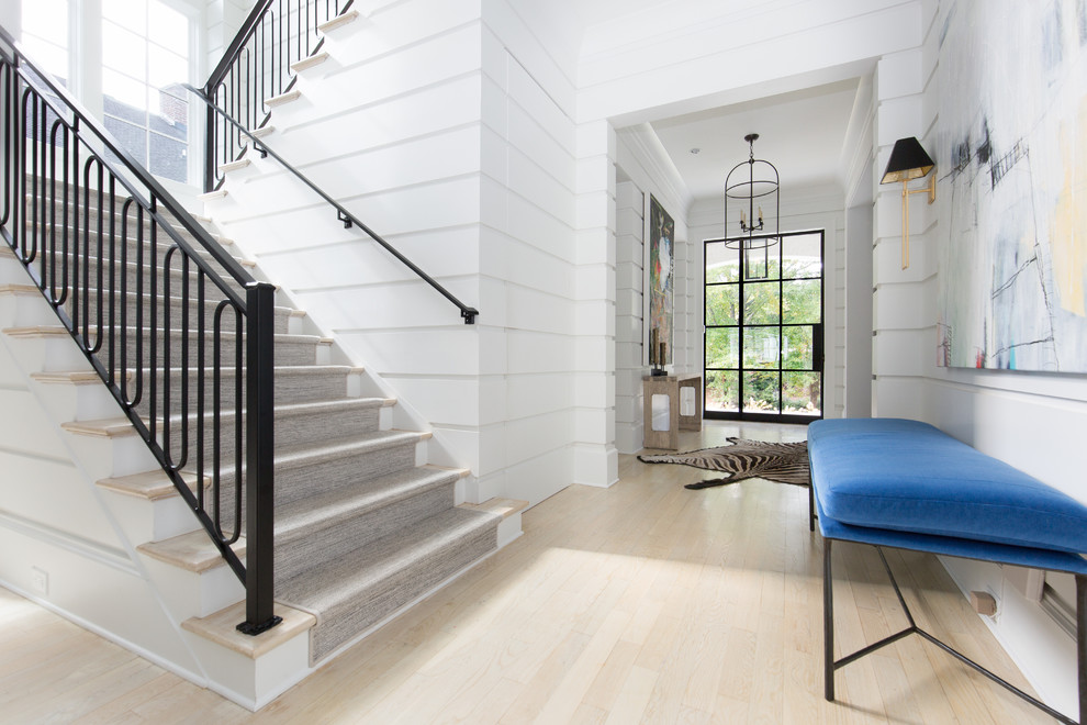 Inspiration for a large timeless wooden u-shaped metal railing staircase remodel in Atlanta with wooden risers