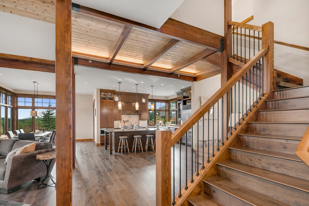 Inspiration for a rustic wooden straight mixed material railing staircase remodel in Seattle with wooden risers
