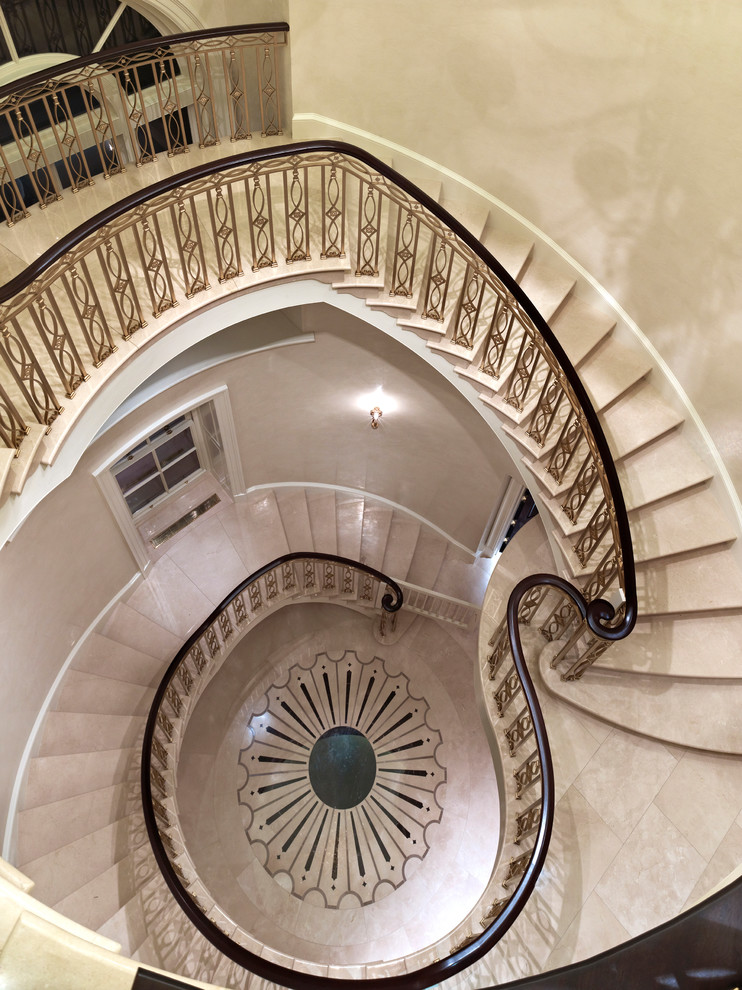 Elegant curved staircase photo in Dallas