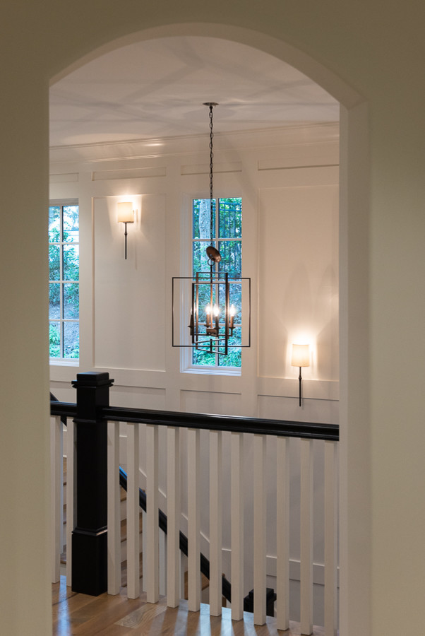 This is an example of an expansive traditional staircase in Atlanta.