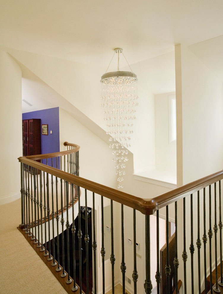 Inspiration for a large timeless wooden u-shaped staircase remodel in Chicago with wooden risers
