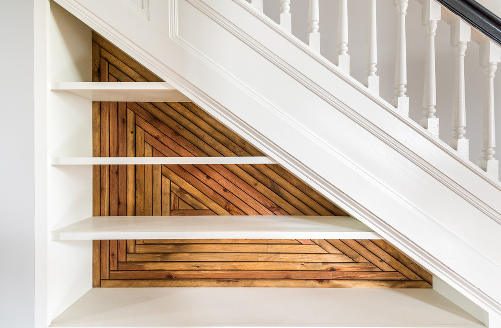 Exemple d'un escalier peint droit tendance de taille moyenne avec des marches en bois.