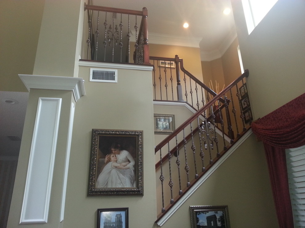 Updated Wood Balusters to Wrought Iron Balusters Traditional