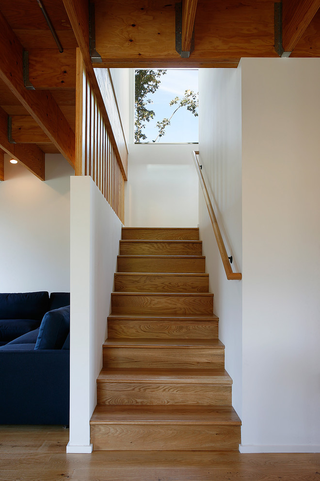 Example of a farmhouse staircase design in Seattle