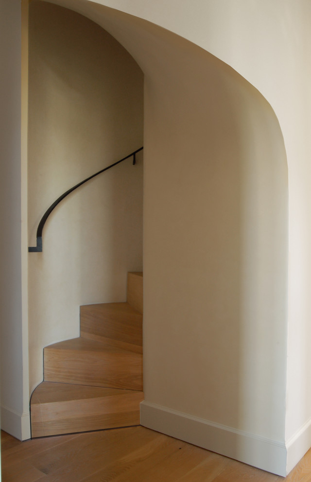 Idées déco pour un escalier courbe contemporain.