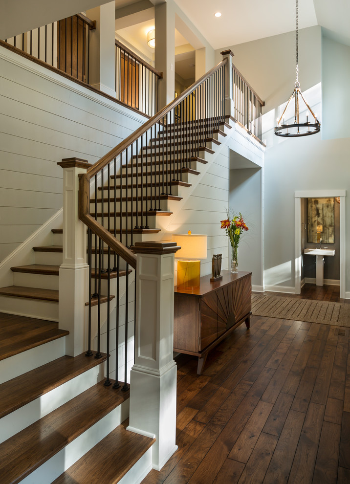 Staircase - mid-sized transitional wooden l-shaped mixed material railing staircase idea in Minneapolis with painted risers