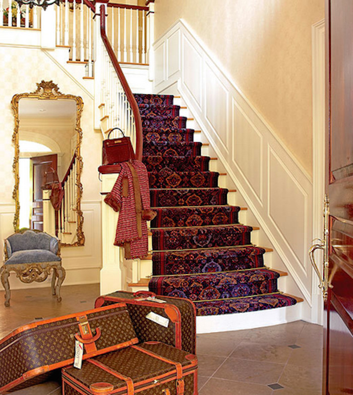 Inspiration for a medium sized traditional wood curved wood railing staircase in New York with wood risers.