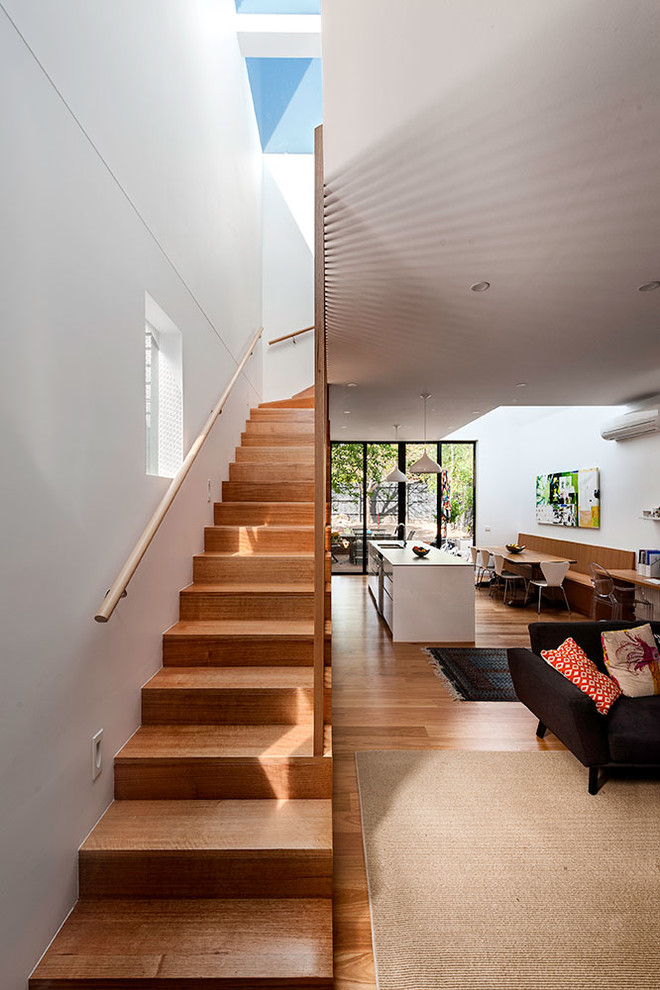 Staircase - mid-sized contemporary wooden straight staircase idea in Melbourne with wooden risers