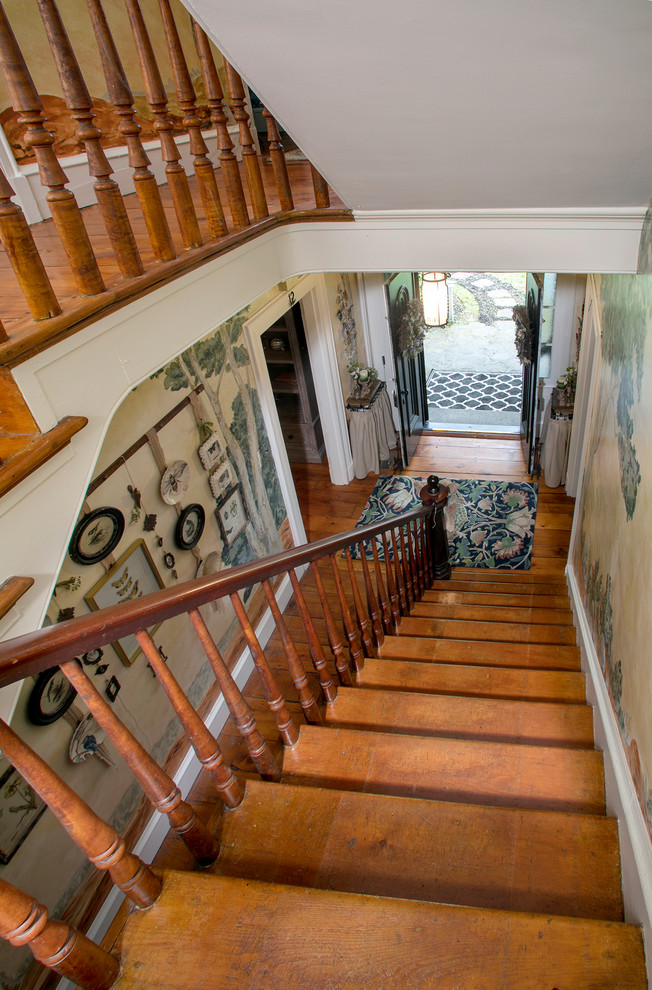 Example of a mid-sized ornate wooden straight wood railing staircase design in Philadelphia with wooden risers