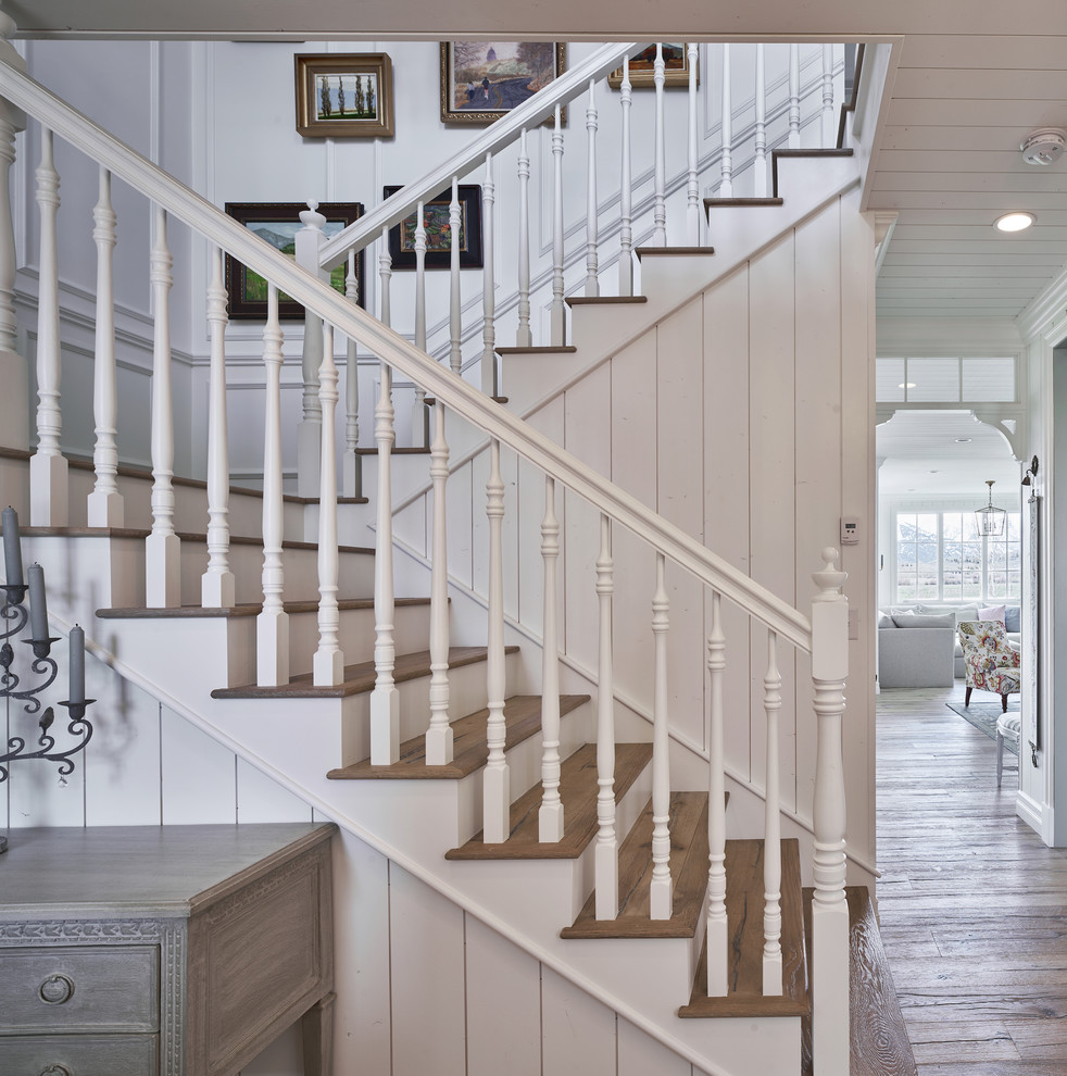 Example of a cottage staircase design in Other