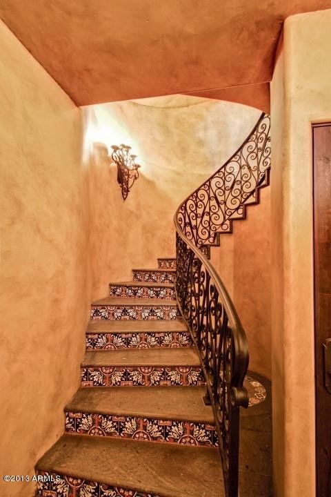 Staircase - huge mediterranean spiral staircase idea in Phoenix