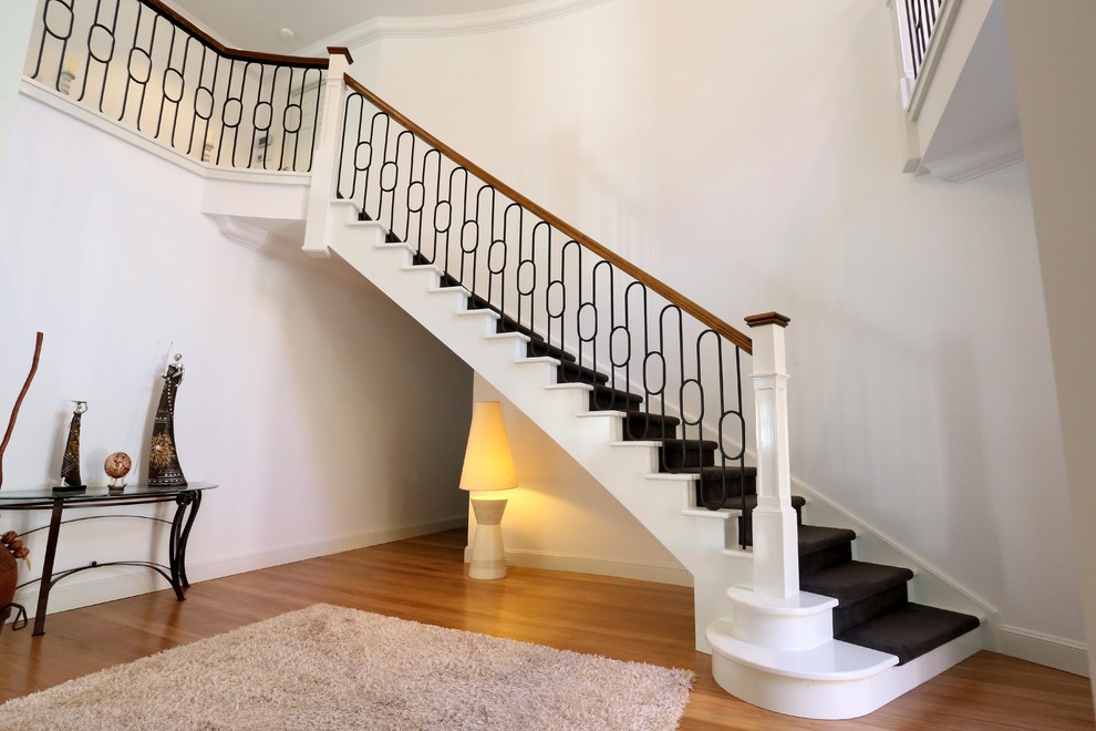 This is an example of a contemporary staircase in Sydney with feature lighting.