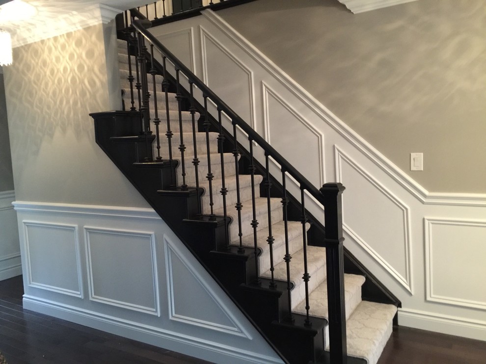 Staircase - mid-sized contemporary wooden straight wood railing staircase idea in Toronto with wooden risers