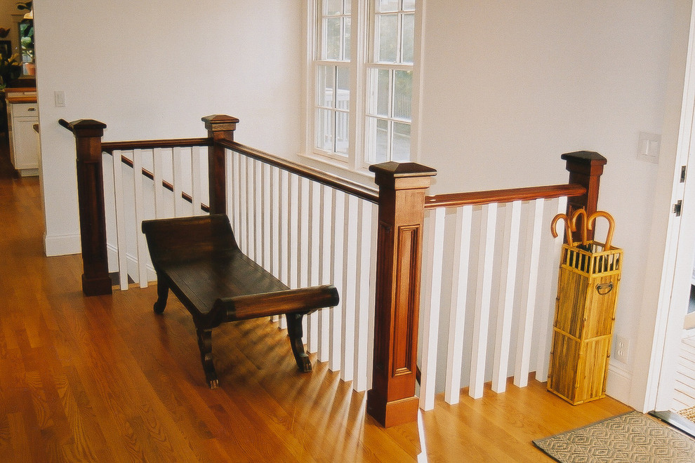 Inspiration for a medium sized classic wood l-shaped staircase in San Francisco with wood risers.