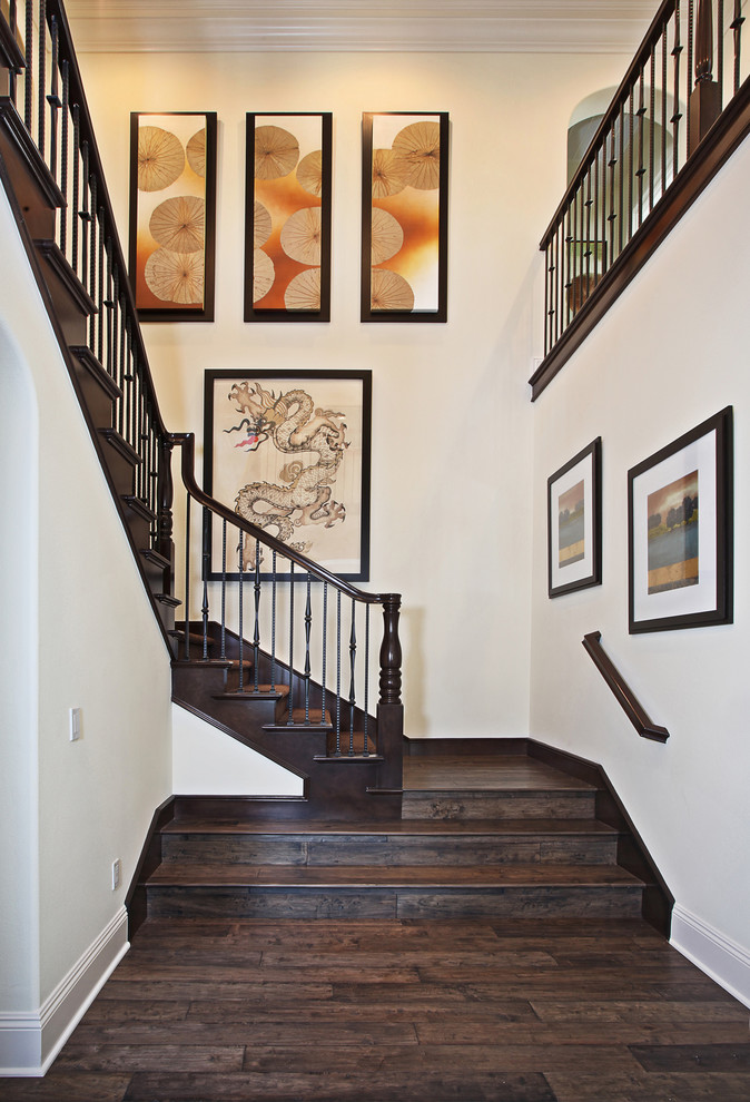 Inspiration for an asian wooden staircase remodel in Orange County with wooden risers