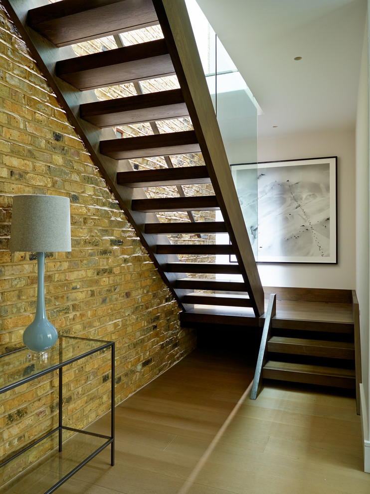Contemporary staircase in London with feature lighting.
