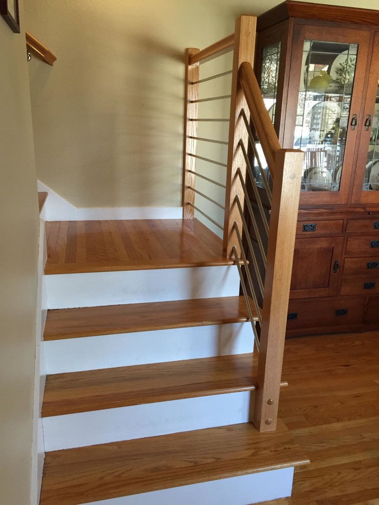 Staircase - small contemporary wooden l-shaped staircase idea in San Francisco with wooden risers