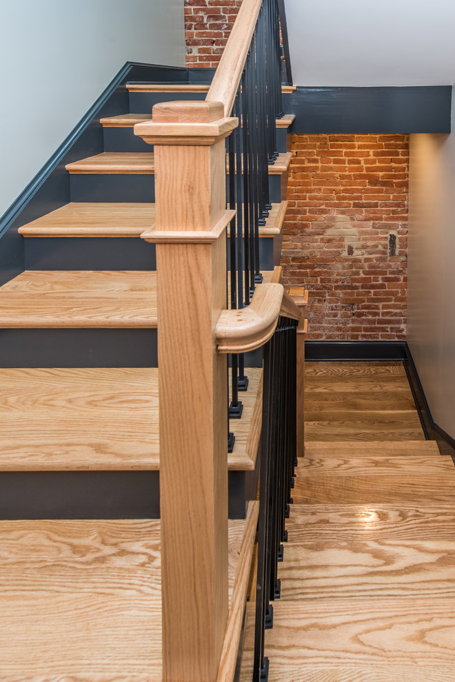 Small transitional wooden u-shaped mixed material railing staircase photo in DC Metro with painted risers