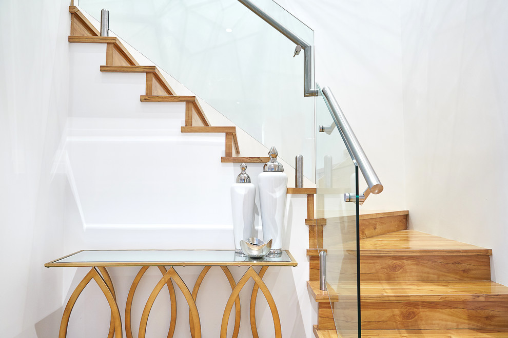 Inspiration for a contemporary wood staircase in Perth with wood risers.