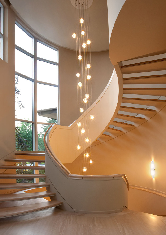 Photo of a contemporary staircase in Toronto with open risers.