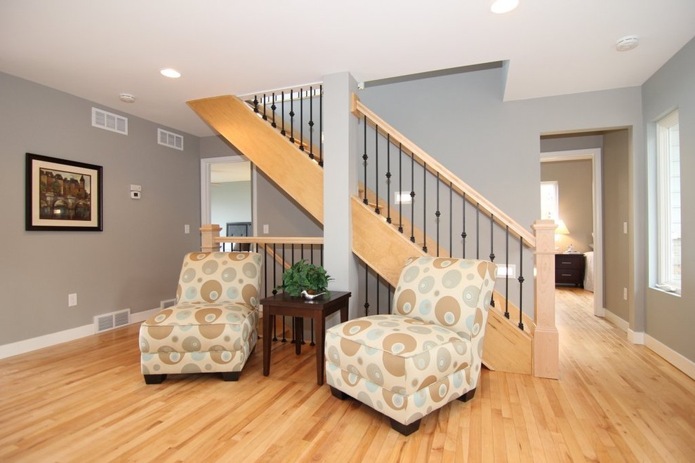 Mid-sized elegant wooden straight staircase photo in Wichita with wooden risers