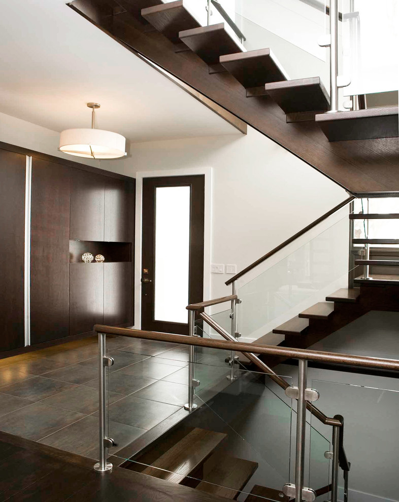 Staircase - contemporary wooden glass railing staircase idea in Ottawa