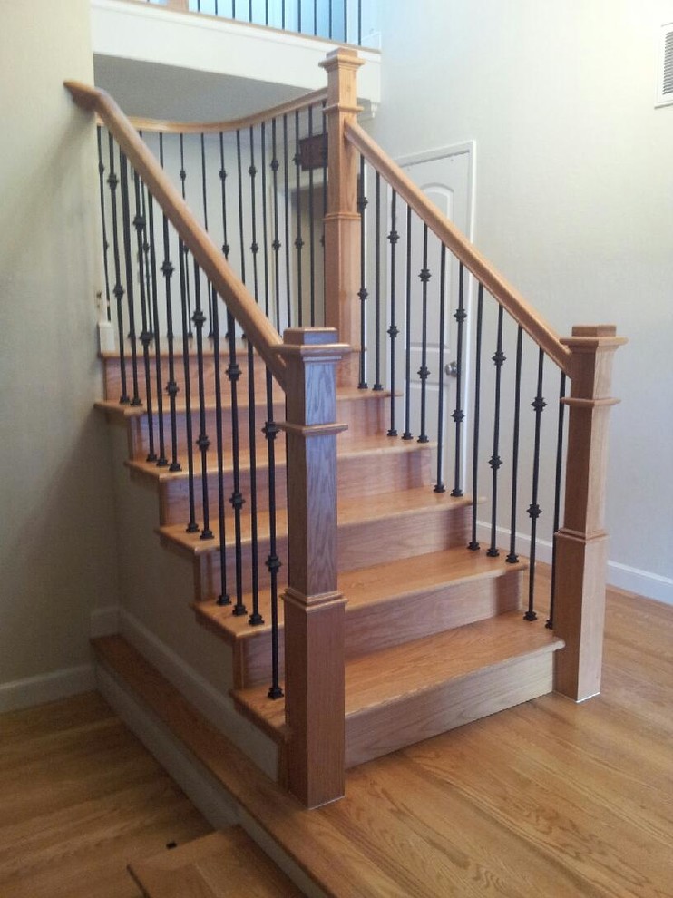 Идея дизайна: угловая деревянная лестница среднего размера в современном стиле с деревянными ступенями
