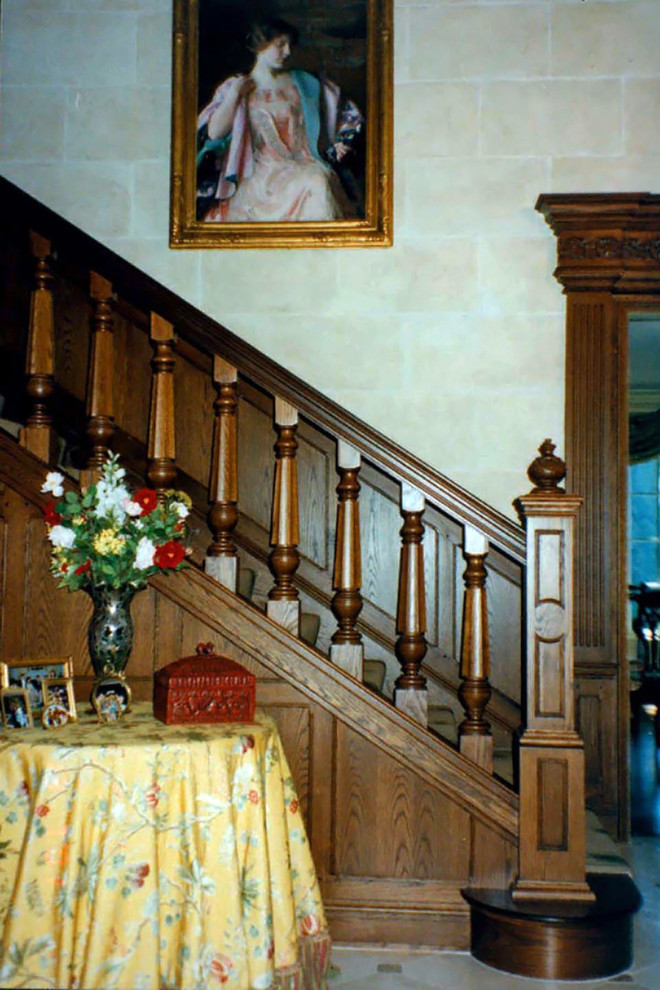 Inspiration for a large timeless wooden l-shaped wood railing staircase remodel in Boston with wooden risers