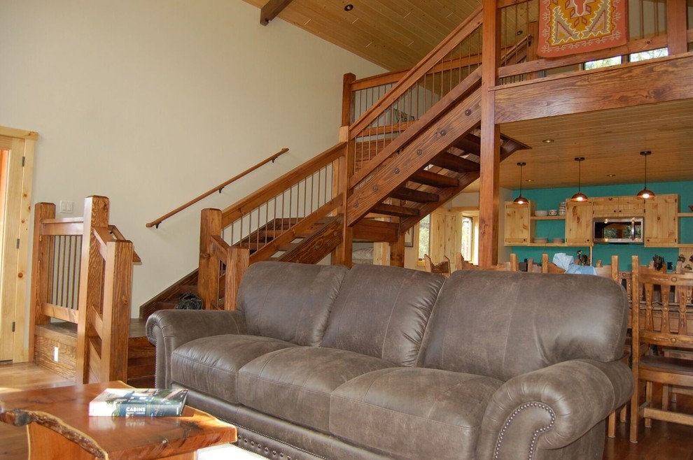 Staircase - mid-sized rustic wooden u-shaped open and wood railing staircase idea in Denver
