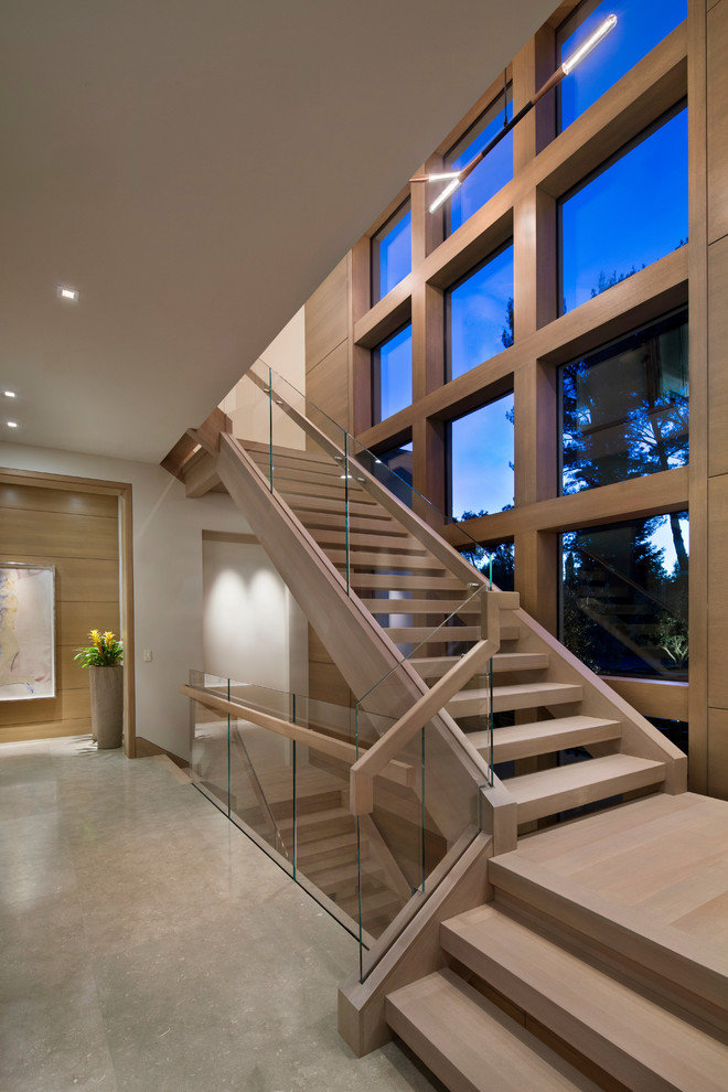 This is an example of a contemporary staircase in San Francisco with open risers.