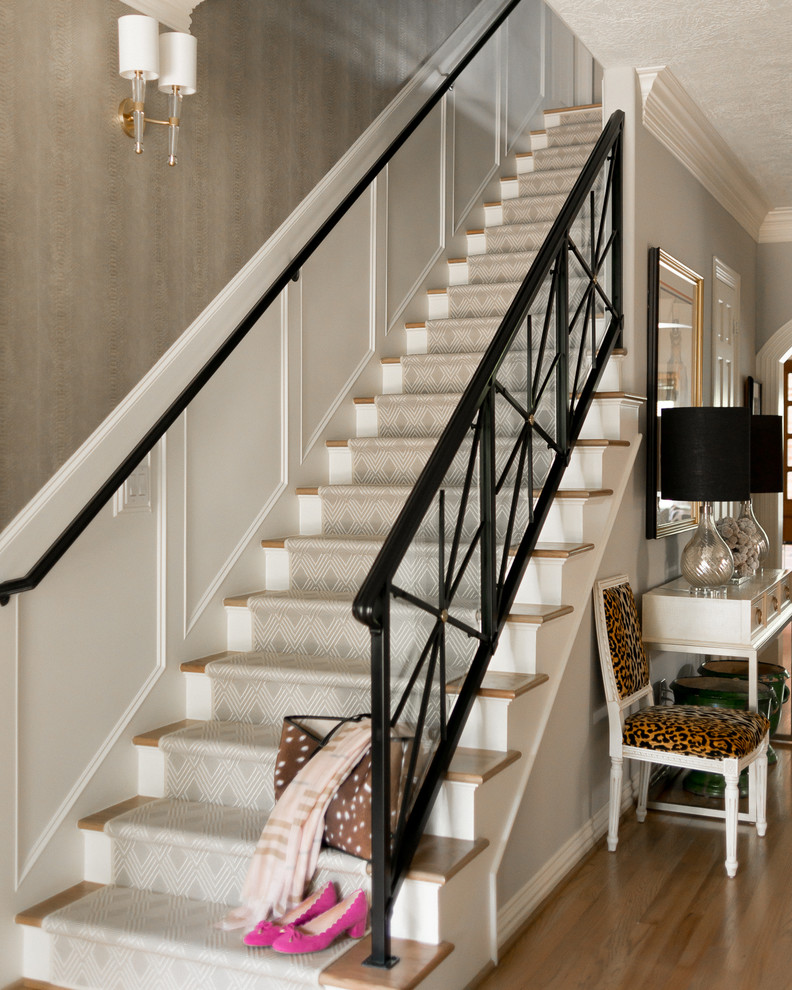 Design ideas for a classic wood straight mixed railing staircase in Houston with painted wood risers and feature lighting.