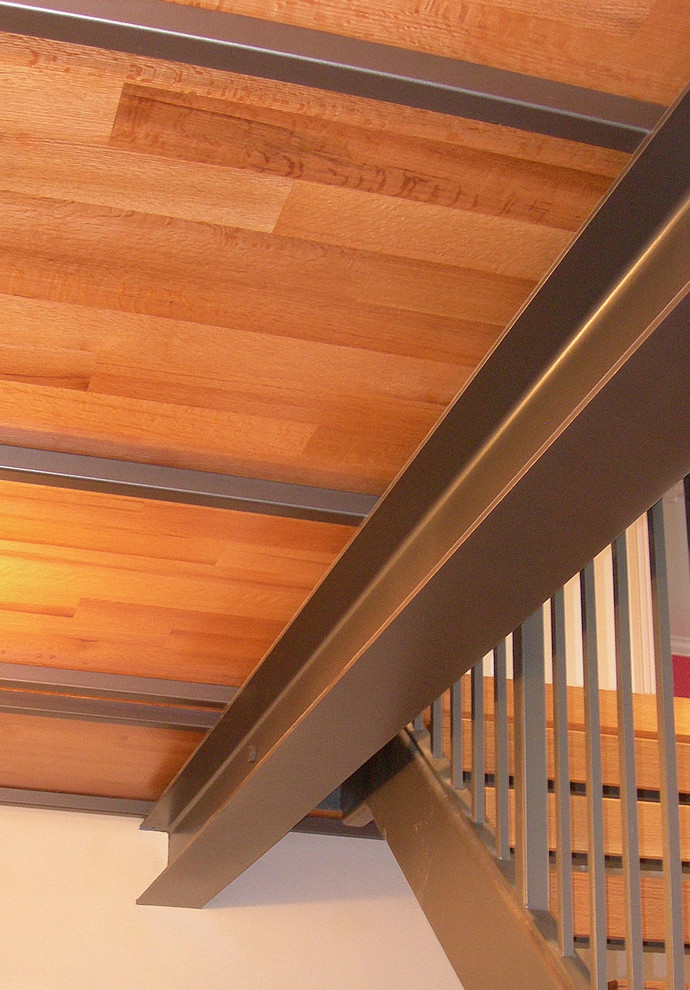 Mid-sized trendy wooden straight open and metal railing staircase photo in Vancouver