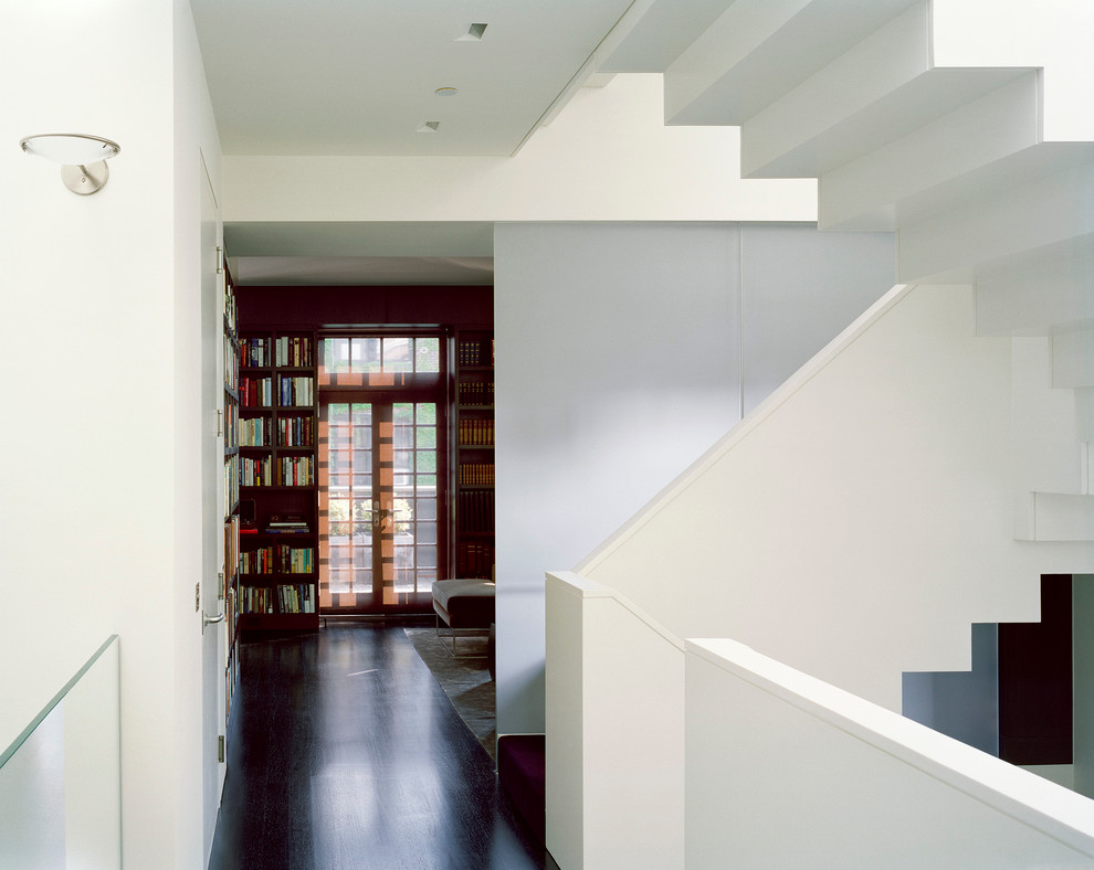 Inspiration for a contemporary staircase in New York with feature lighting.