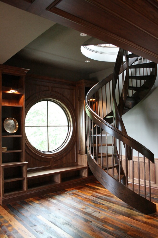 Inspiration for a craftsman spiral staircase remodel in Grand Rapids
