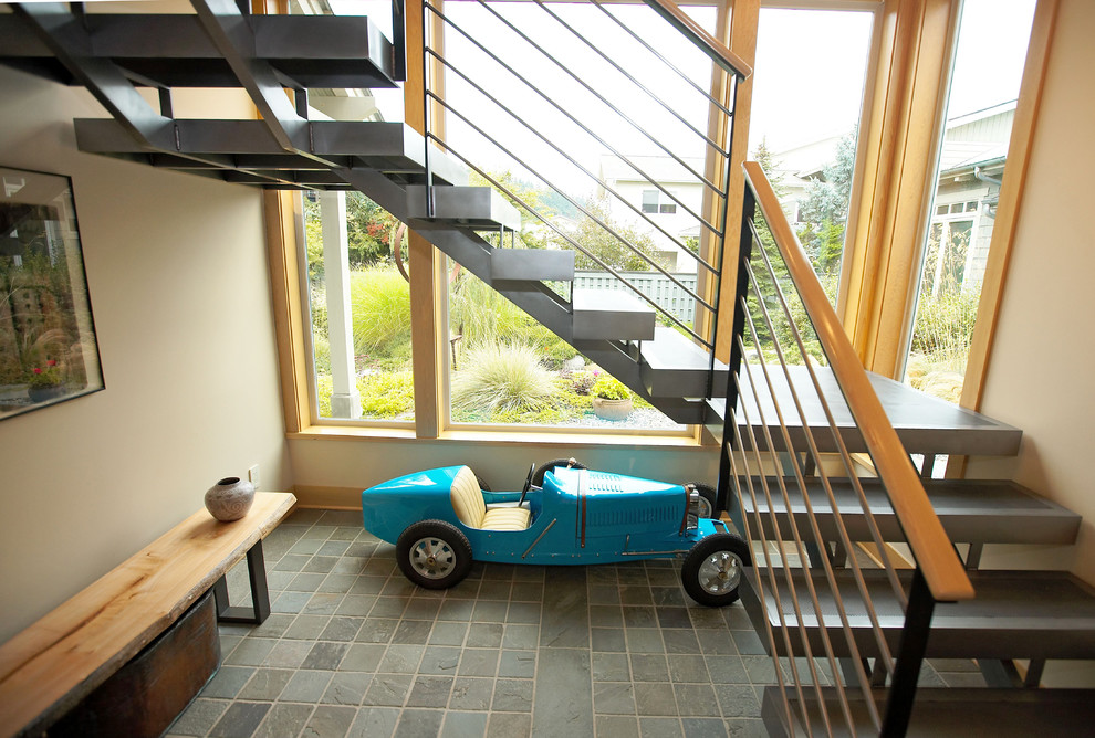 Example of a trendy open staircase design in Seattle