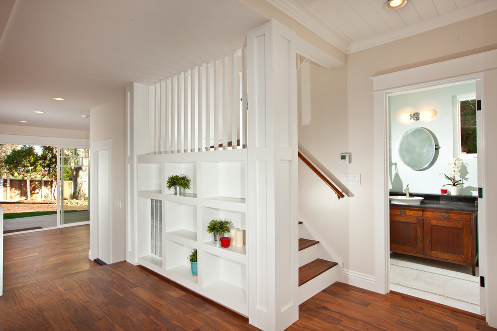 Inspiration pour un escalier craftsman en U avec des marches en bois.