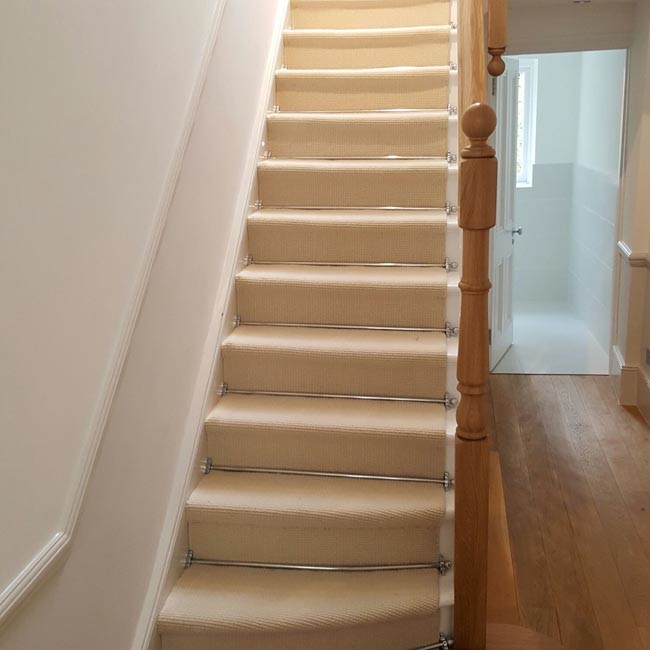 White Stair Carpet With Silver Stair Rods Contemporary Staircase