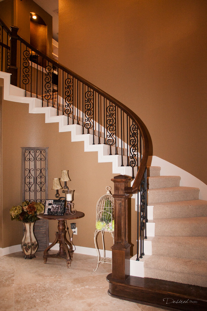 Example of a mid-sized classic wooden curved mixed material railing staircase design in Houston with painted risers