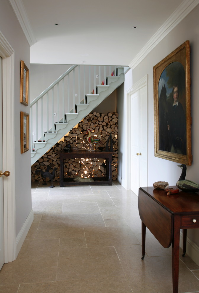 Design ideas for an eclectic staircase in London with under stair storage.