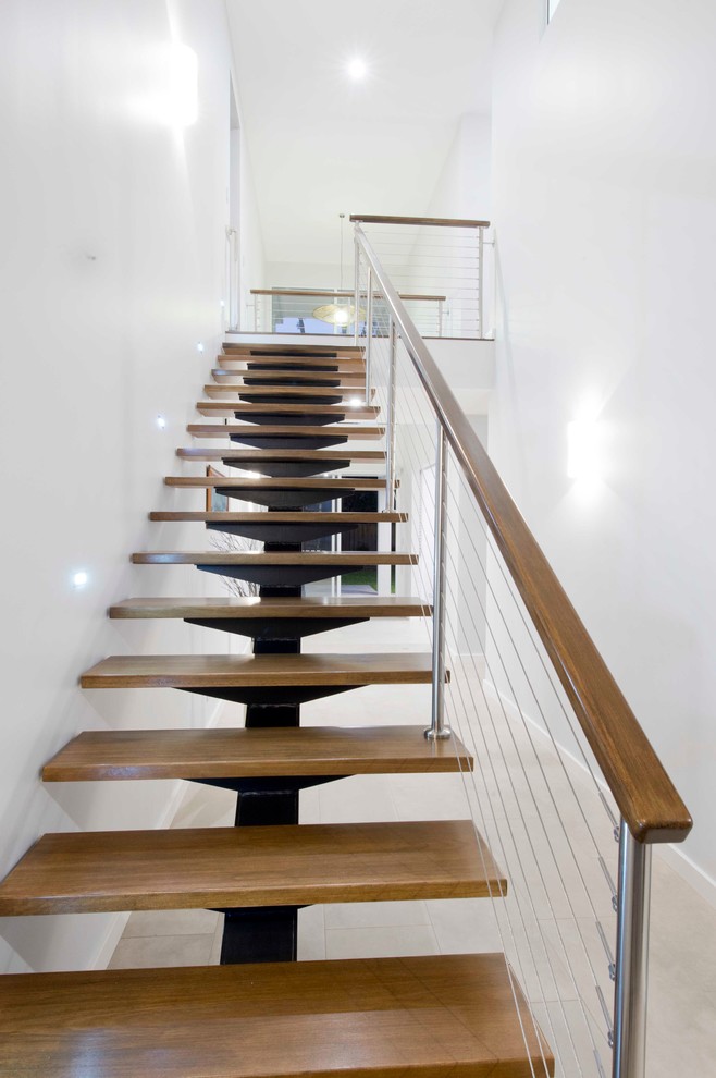 Idéer för en modern rak trappa i trä, med öppna sättsteg